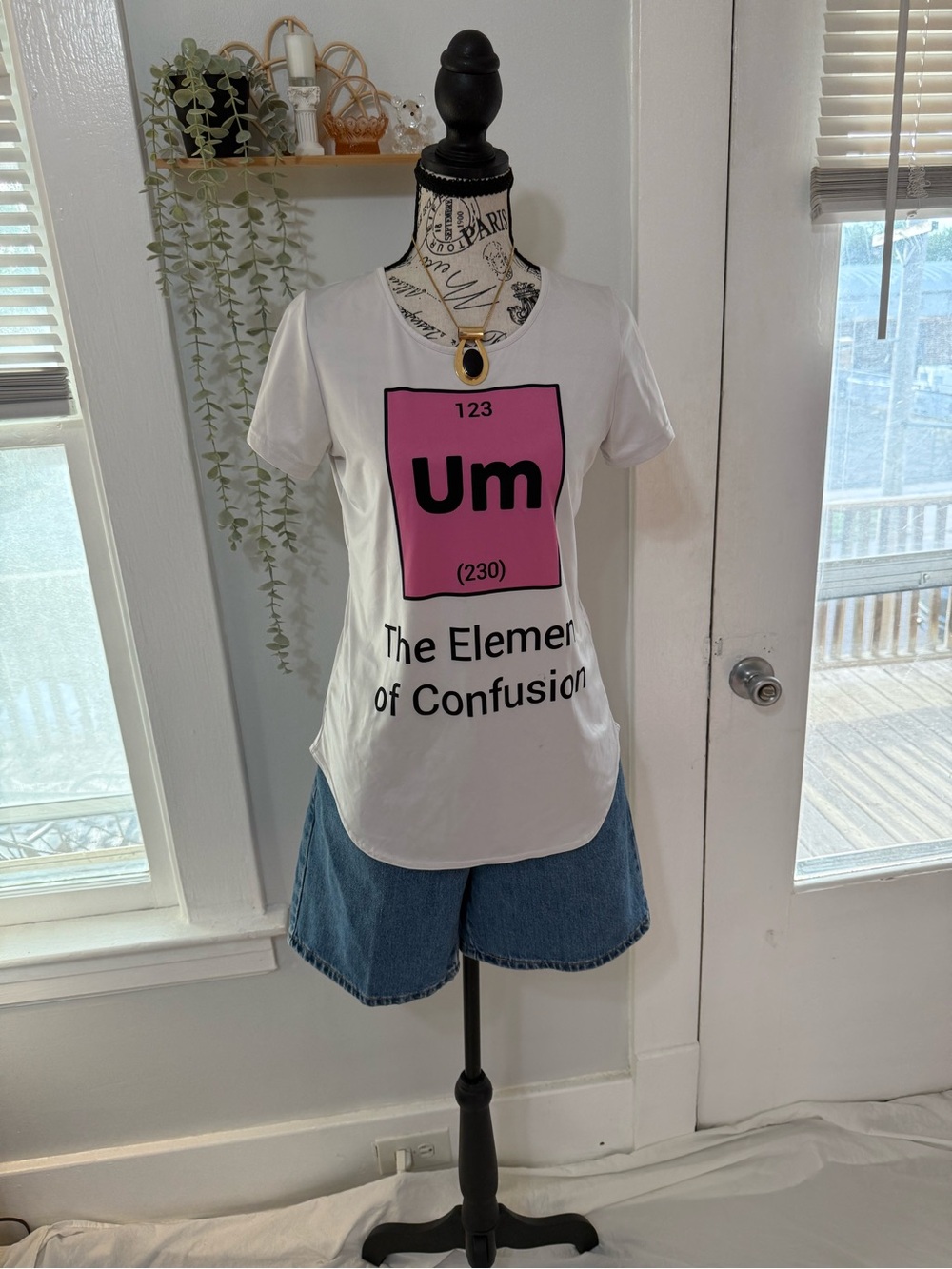 Mondays Child vintage graphic tee with pink 'The Element of Confusion'